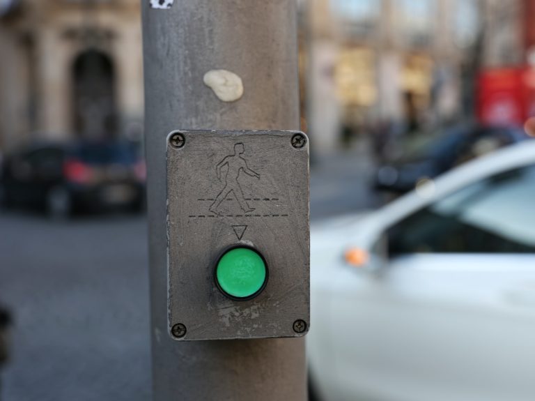 green crosswalk button